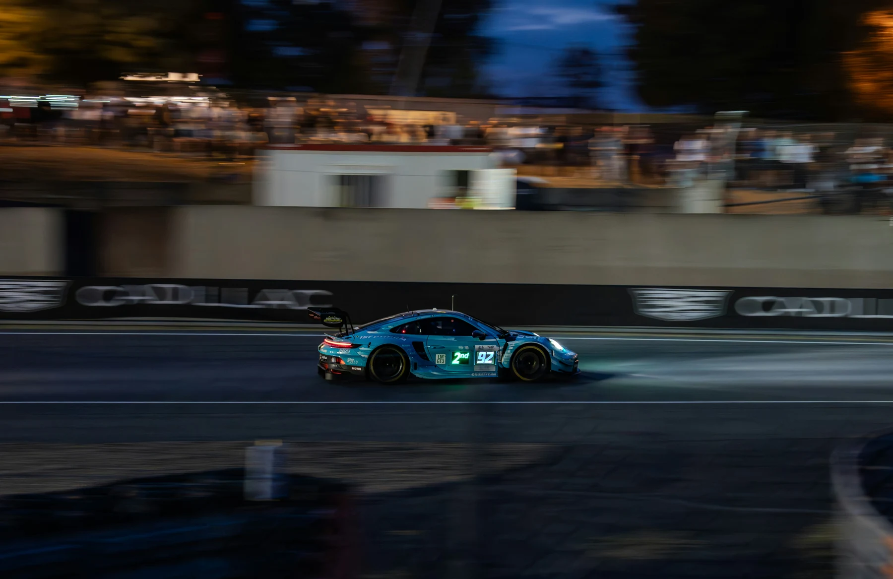 Racing car on a track at night